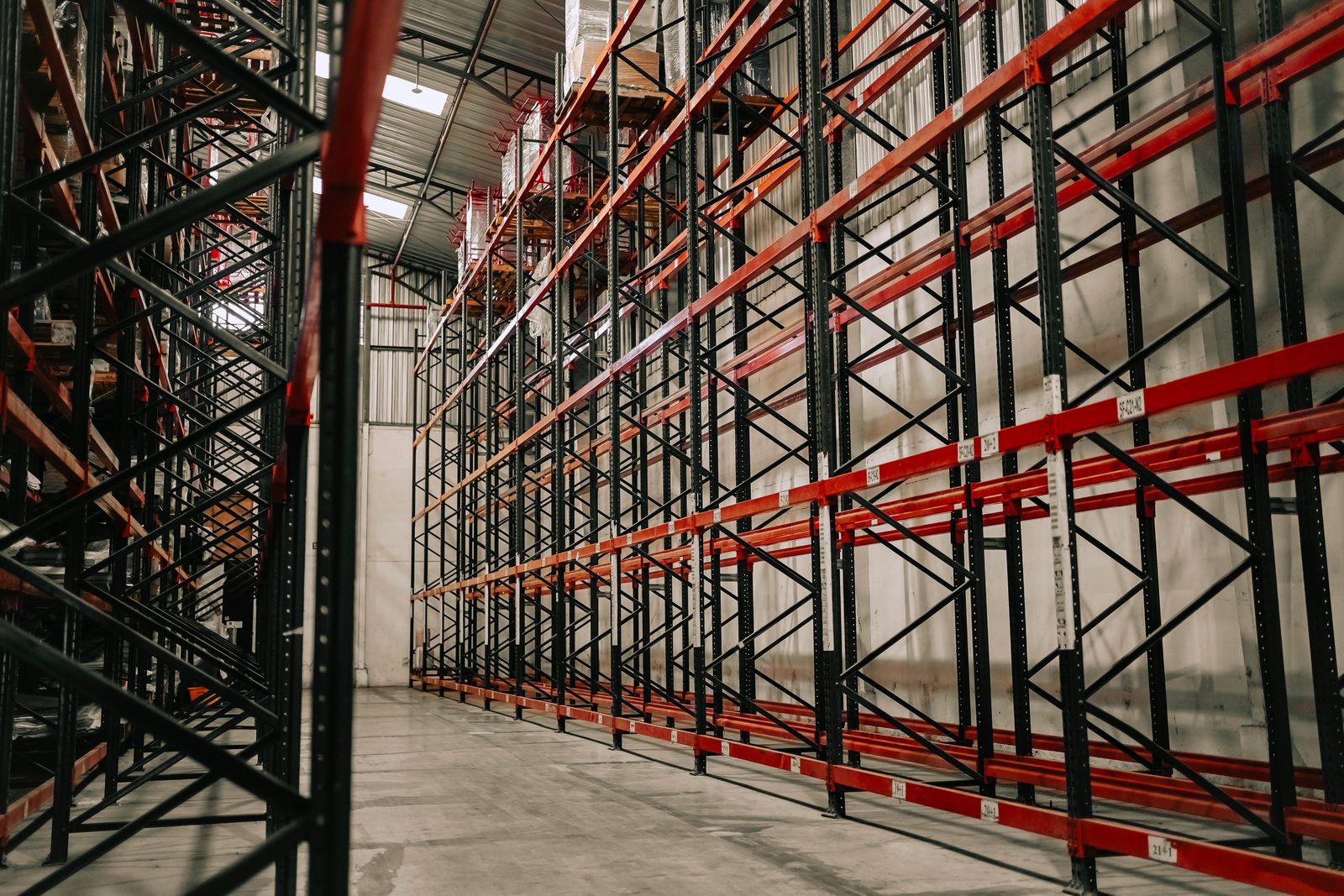 Warehouse interior with pallet racking, representing U.S. buffer stock and domestic fulfillment